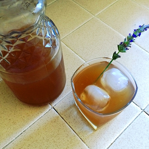 Fresh lavender lemonade - the perfect summer nectar. Mine is brown because I used brown sugar and agave.
