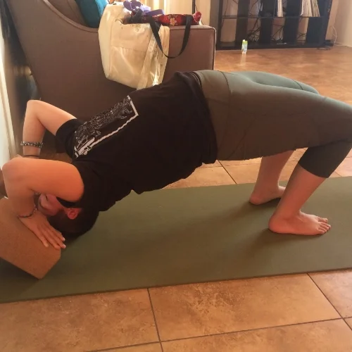 Gabbi December 2015, practicing Urdhva Dhanurasana, a year into her yoga journey. Follow her at @ag.straus (Instagram).