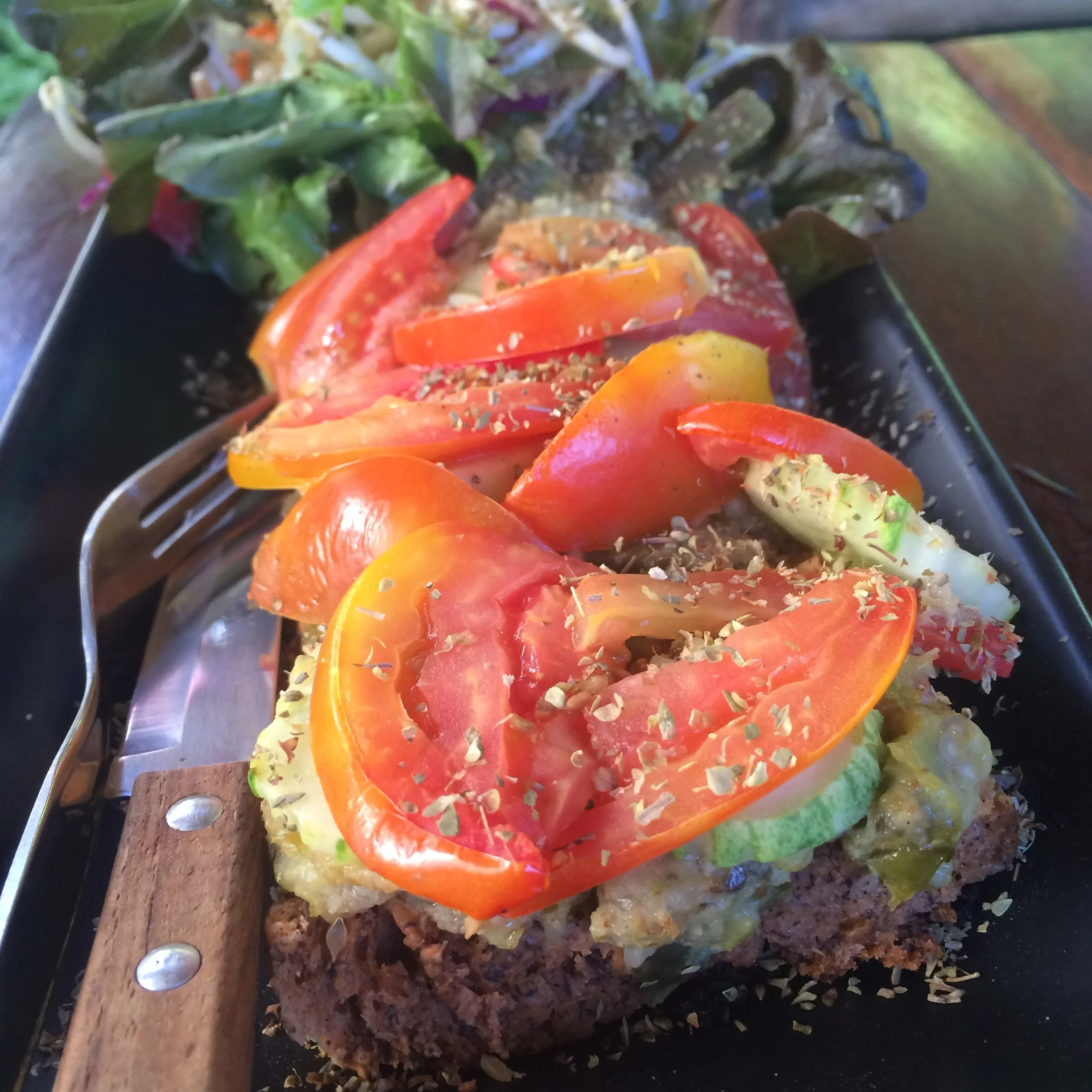 Kunda Breakfast Sandwich - raw homemade bread with eggplant, wasabi (it works!), cucumber, tomato & herbs, served with a salad on the side. Divine!
