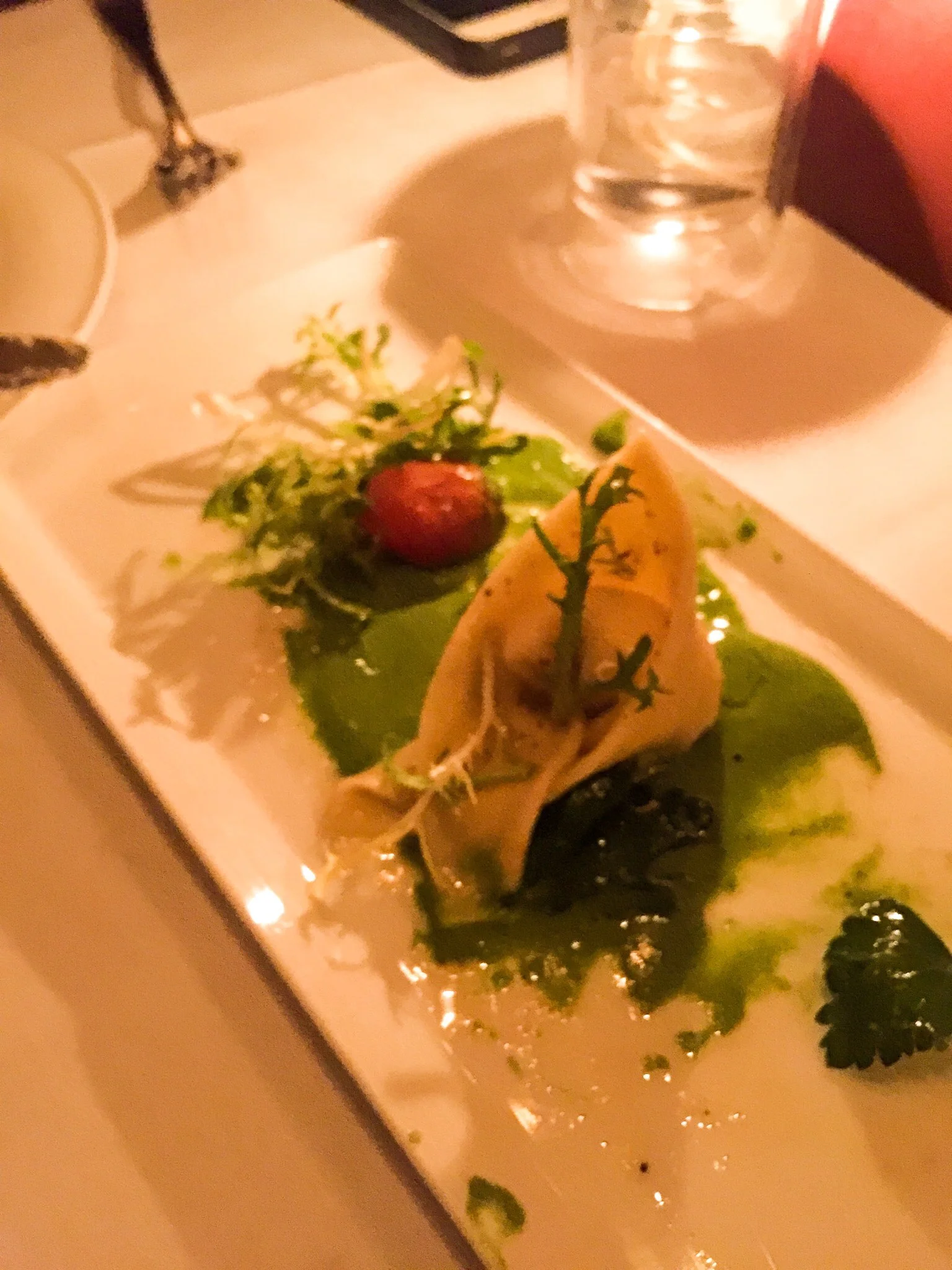 Tortelloni - almond cheese, oven-dried tomatoes, parsley frisee salad, spinach cream.