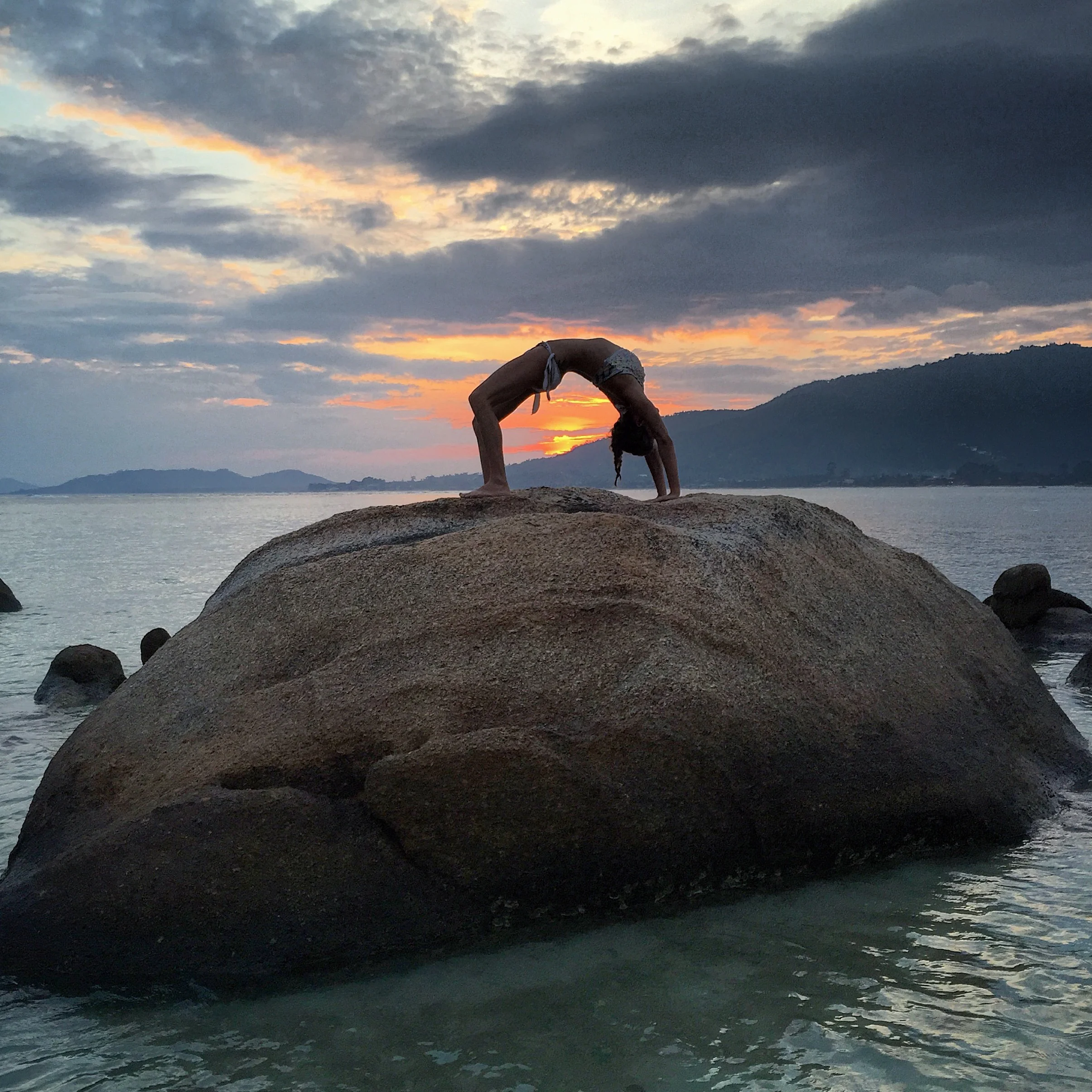 The sun sets on Koh Samui, Thailand.