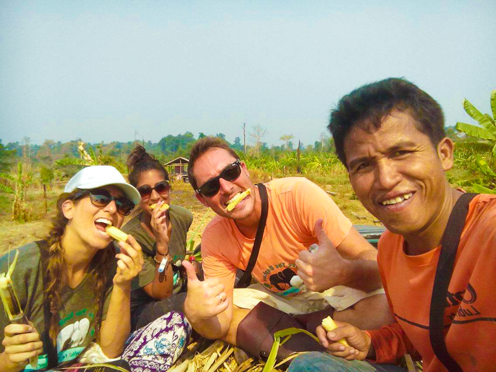 Enjoying a bit of the fresh sugar cane. It's delicious.