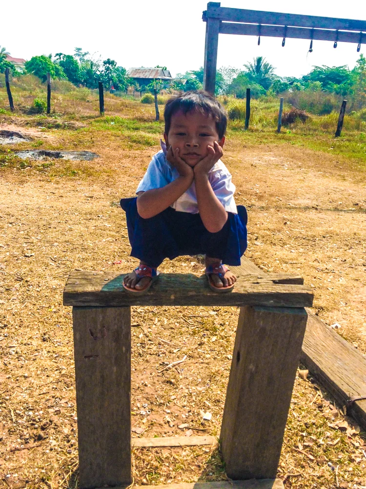 A boy hangs out during recess and a school in rural Cambodia.