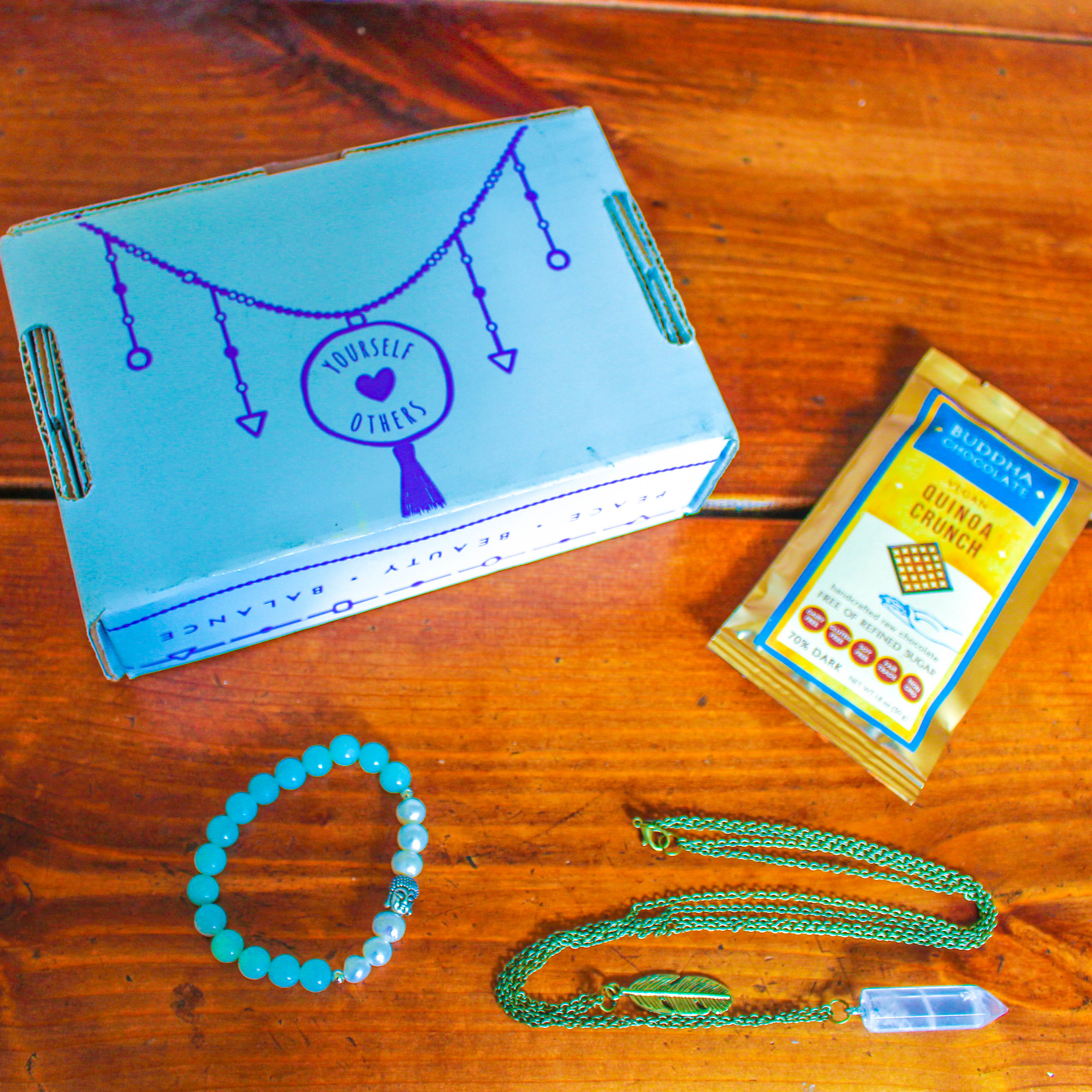 The Yogi Surprise "Jewelry Box" comes with two pieces of jewelry and a piece of chocolate each month!