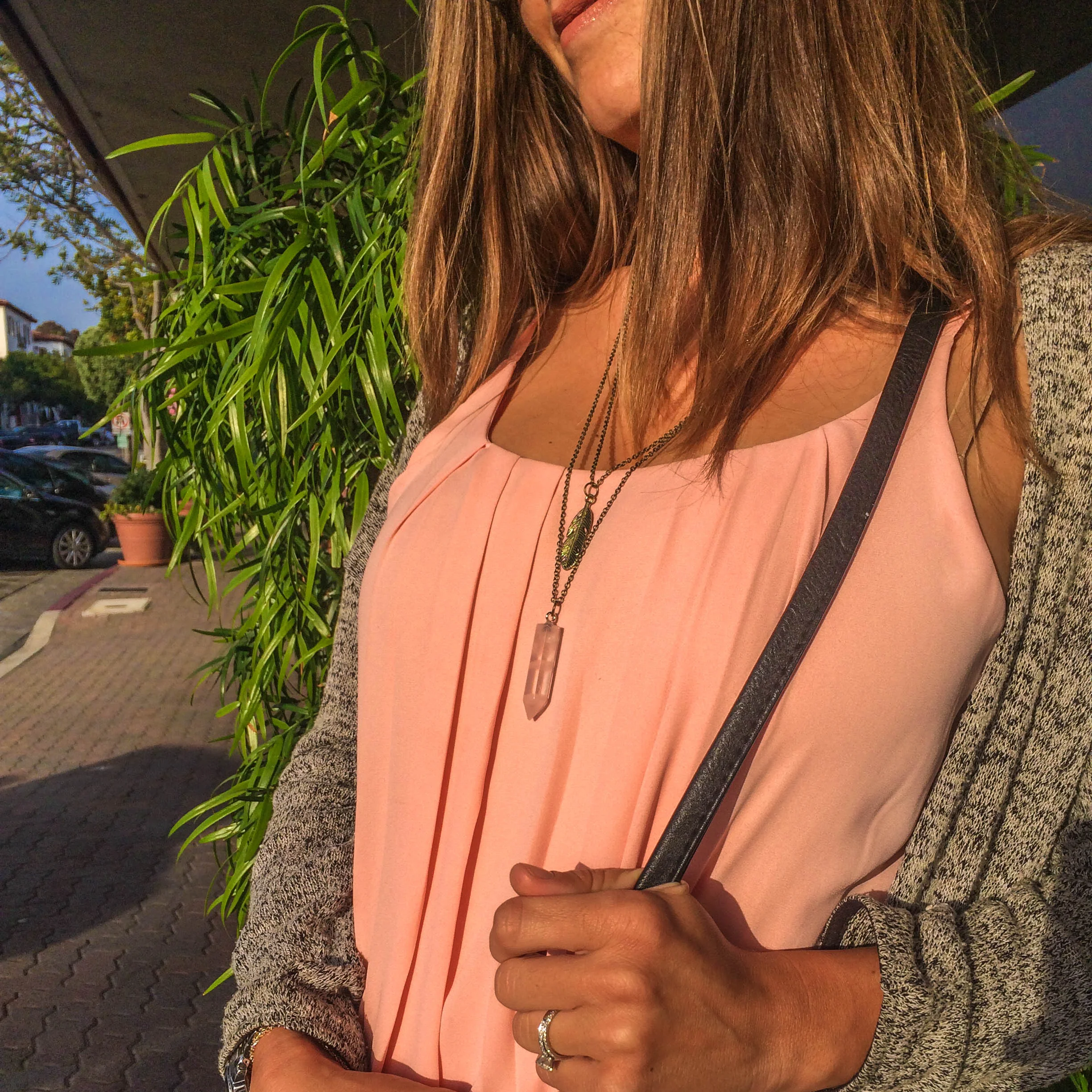 Wearing the "Feather Rose Quartz Point Pendant" from the Yogi Surprise Jewelry Box .