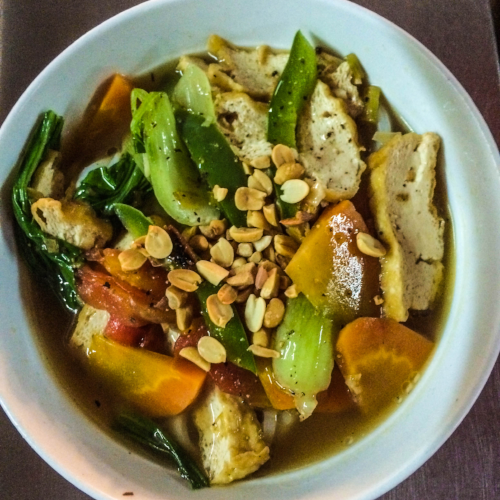 Pete's yummy veggie soap with tofu from Miss Thuy's Vegetable Food Stall in Hoi An.