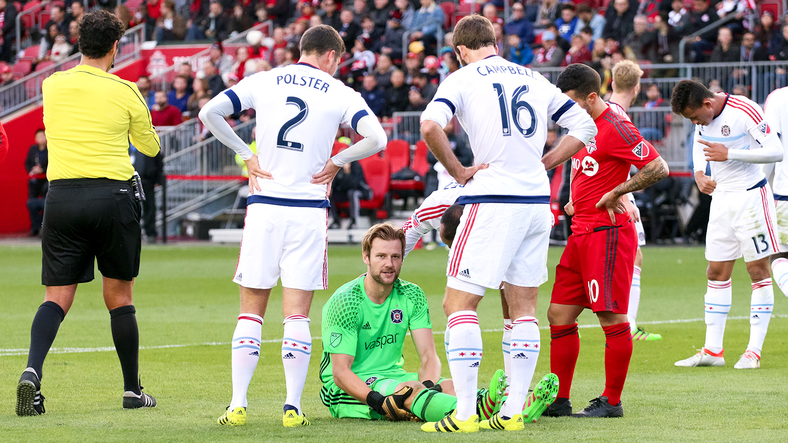 Chicago Fire Goalkeeper Patrick McLain stares down the photographer while waiting to receive medical treatment.