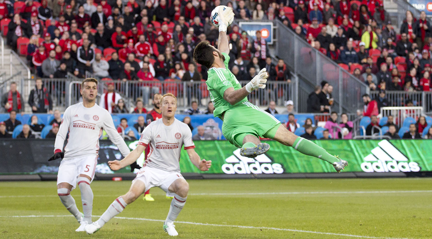 Atlanta United FC goalkeeper Alec Kann makes a massive save against Toronto FC on April 8, 2017. Image by Dennis Marciniak of denMAR Media.