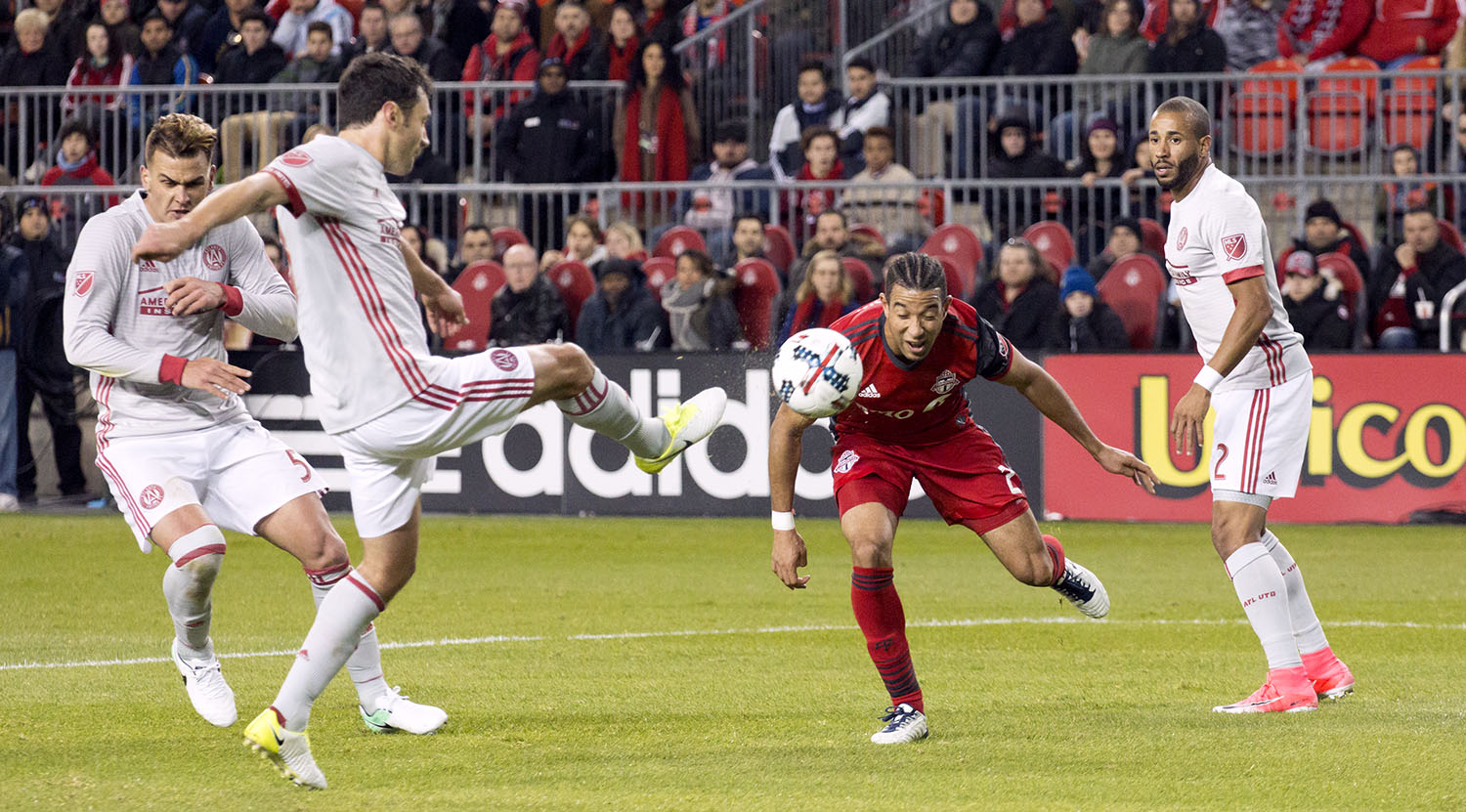 Justin Morrow goes in for a dangerous header against Atlanta United FC. Image by Dennis Marciniak of denMAR Media.