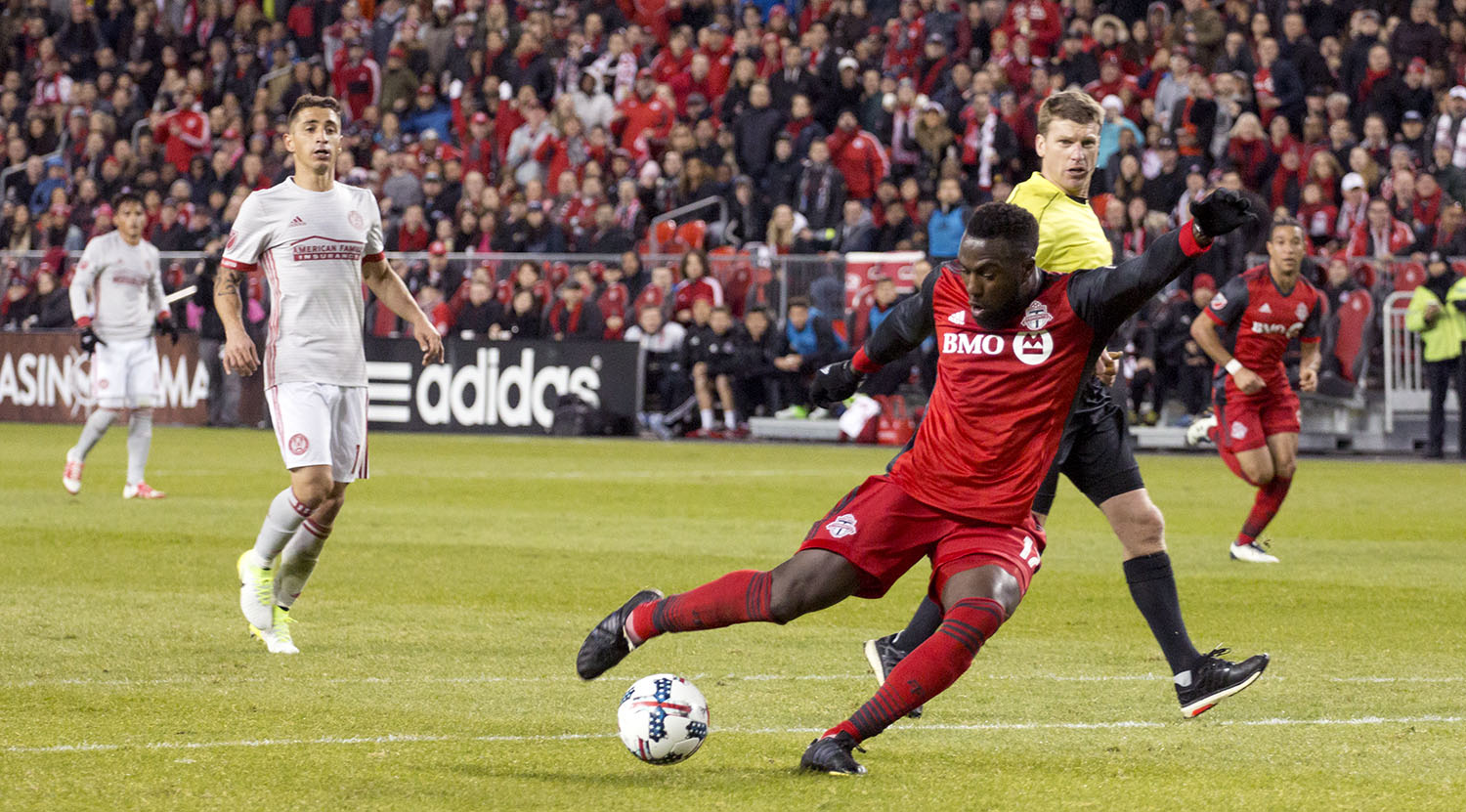 Jozy Altidore strieks the ball on goal against Atlanta United FC in a MLS regular season game at BMO Field. Image by Dennis Marciniak of denMAR Media.