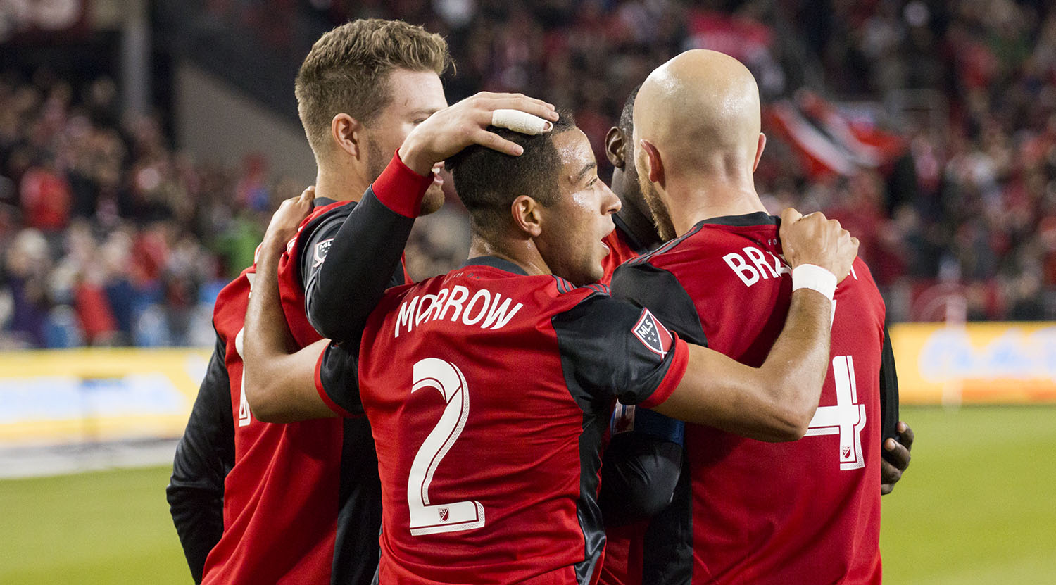 Justin Morrow celebrates his goal against Atlanta United FC with Michael Bradley at BMO FIeld on April 8, 2017. Image by Dennis Marciniak of denMAR Media.