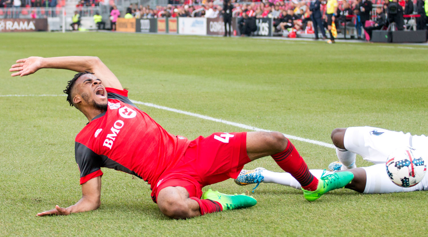 Raheem Edwards is taken to ground that by a Minnesota United player in which a penalty kick was called. Image by Dennis Marciniak of denMAR Media.