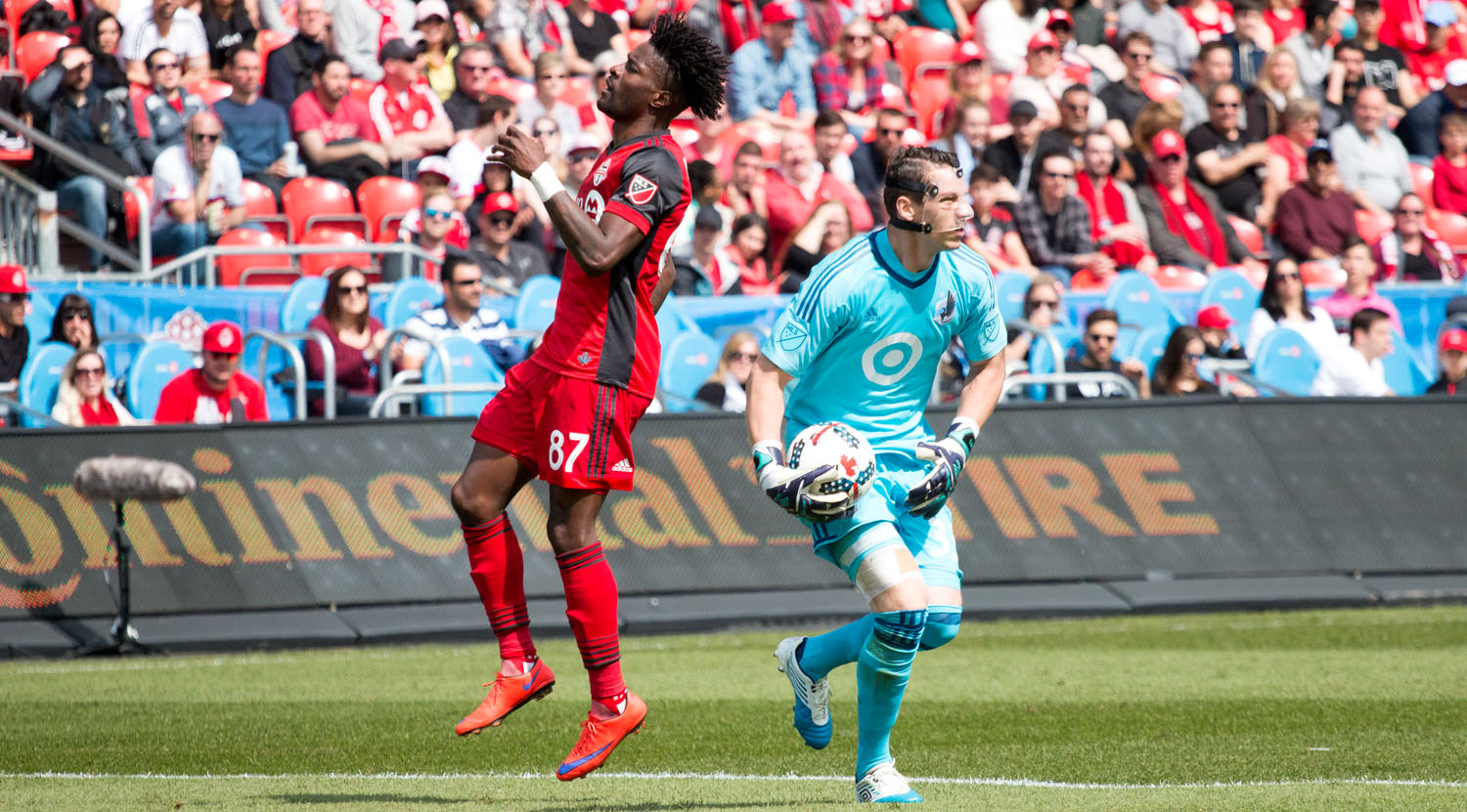 Tosaint Ricketts just missed uot on a ball that was snagged by Bobby Shuttleworth who was wearing a face mask for the duration of the match. Image by Dennis Marciniak of denMAR Media.