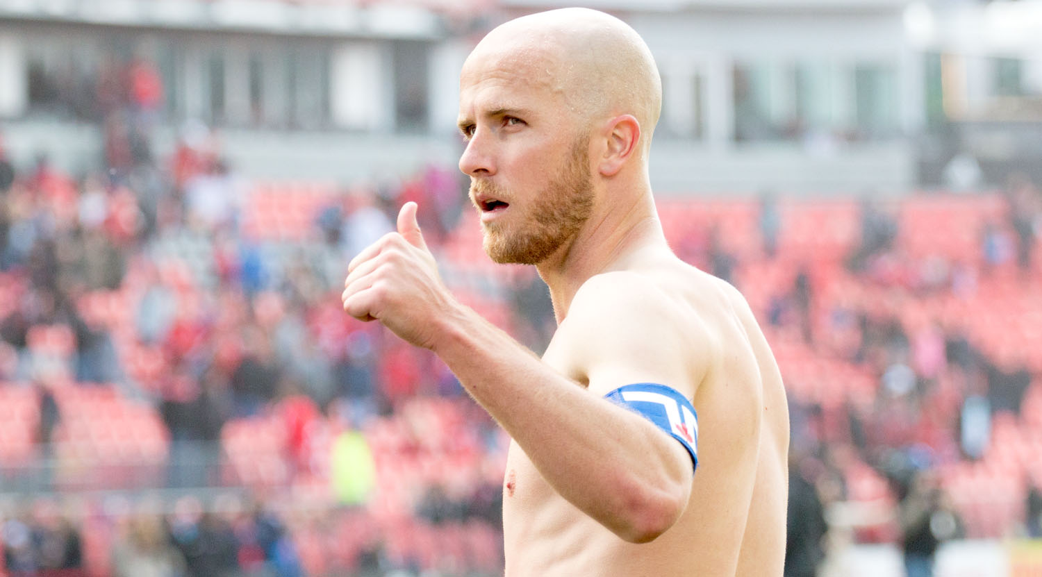 Michael Bradley giving the thumbs up to fans with the Toronto Flag captain armband after a beautiful 3-2 win over Minnesota United FC. Image by Dennis Marciniak of denMAR Media.