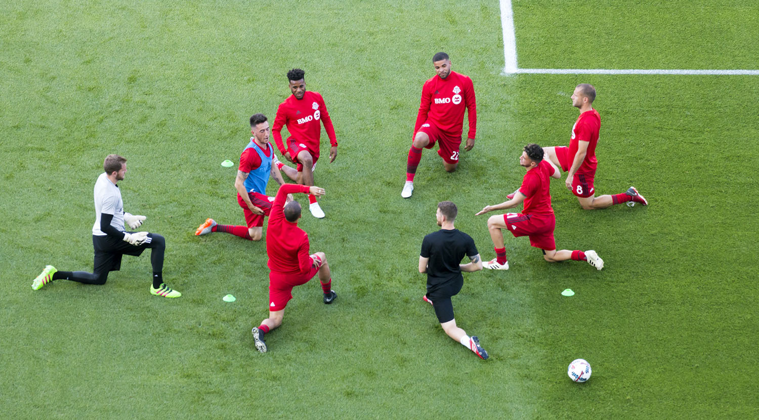 Toronto FC doing their pregame stretches before an Major League Soccer match in 2017. Image by Dennis Marciniak of denMAR Media.
