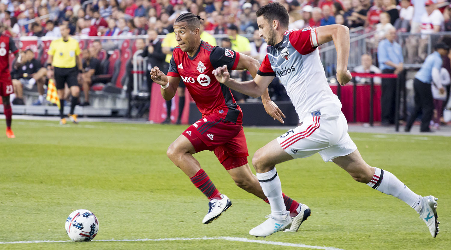 Justin Morrow trying to play the ball into space during a match against DC United in June 2017. Image by Dennis Marciniak of denMAR Media.
