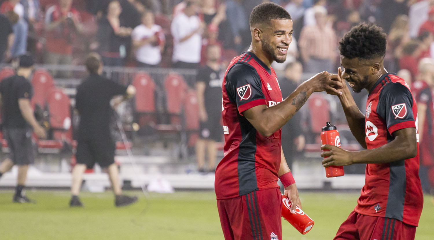 Jordan Hamilton and Raheem Edwards do a little finger thing in celebration of a 2-0 win over DC United. Image by Dennis Marciniak of denMAR Media.
