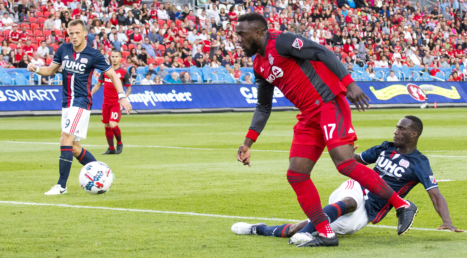 Jozy Altidore gets the ball poked away from him. Image by Dennis Marciniak of denMAR