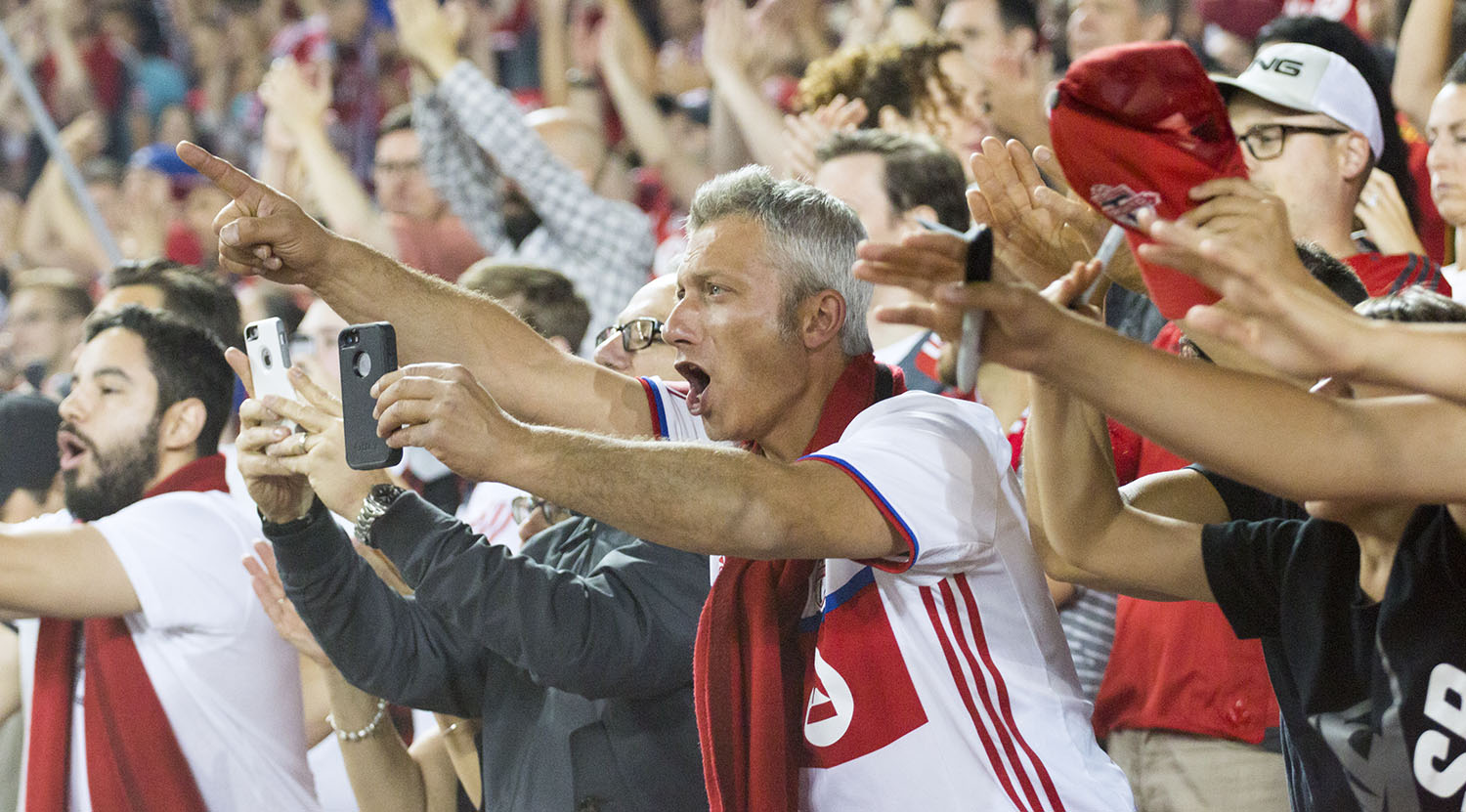 Fans in the south end supporter's section are lit up as Toronto FC score their second goal on the night. Image by Dennis Marciniak of denMAR Media.