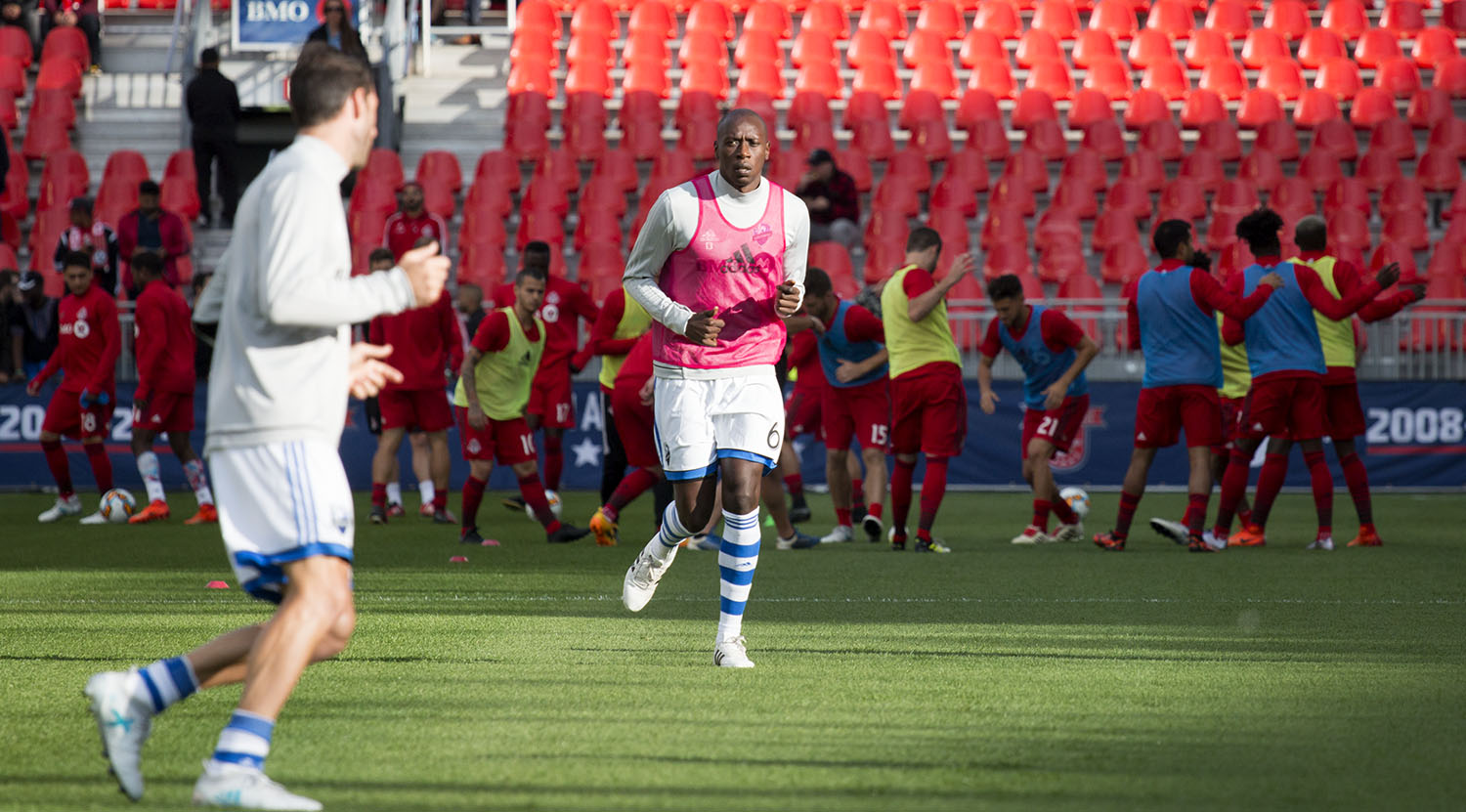 Hassoun Camara of the Montreal Impact does his warm ups in front of a Toronto FC squad warming up before the Canadian Championship in 2017. Image by Dennis Marciniak of denMAR Media.