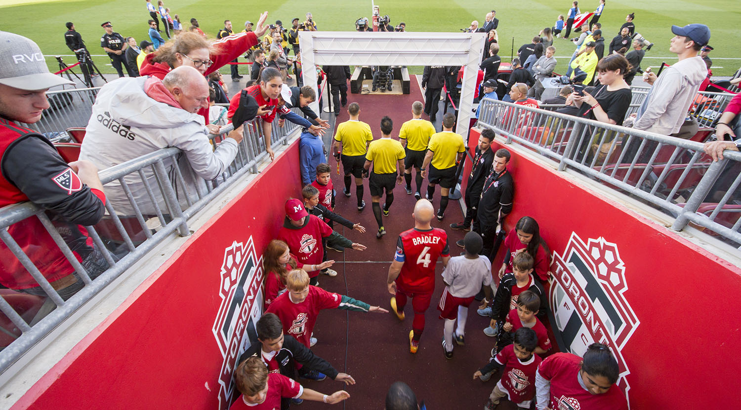 Michael Bradley comes out of the tunnel greeted by fans during the Canadian Championship in 2017. Image by Dennis Marciniak of denMAR Media.