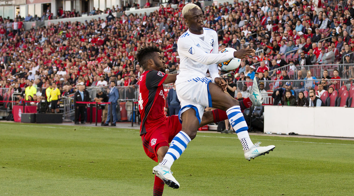 Toronto FC and Montreal Impact clash during a match for the Voyageur's cup in 2017. Image by Dennis Marciniak of denMAR Media.