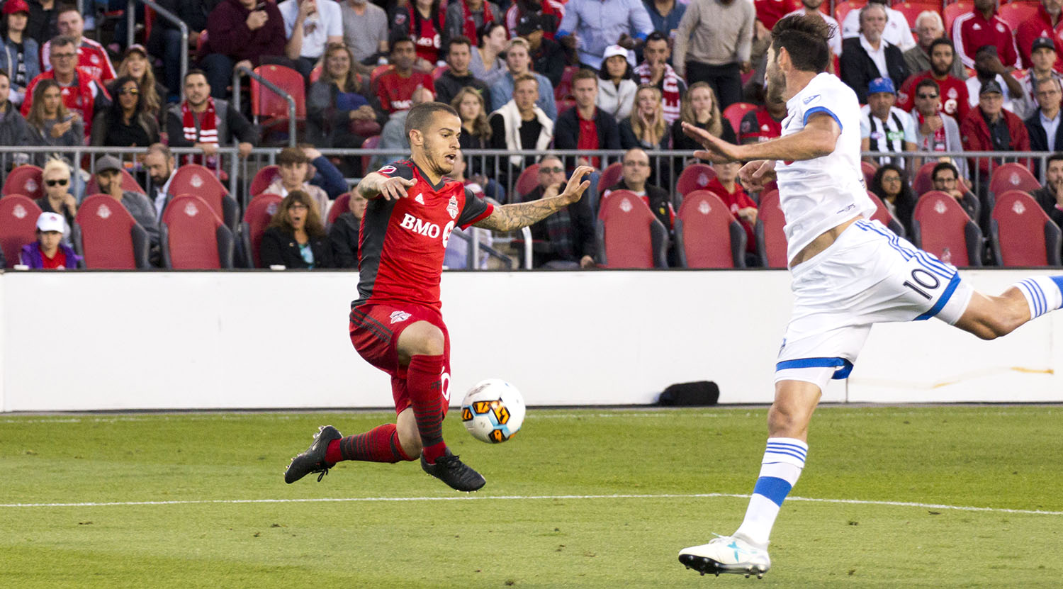 Giovinco and Ignacio Piatti in the air as both teams struggle to find a second goal. Image by Dennis Marciniak of denMAR Media.