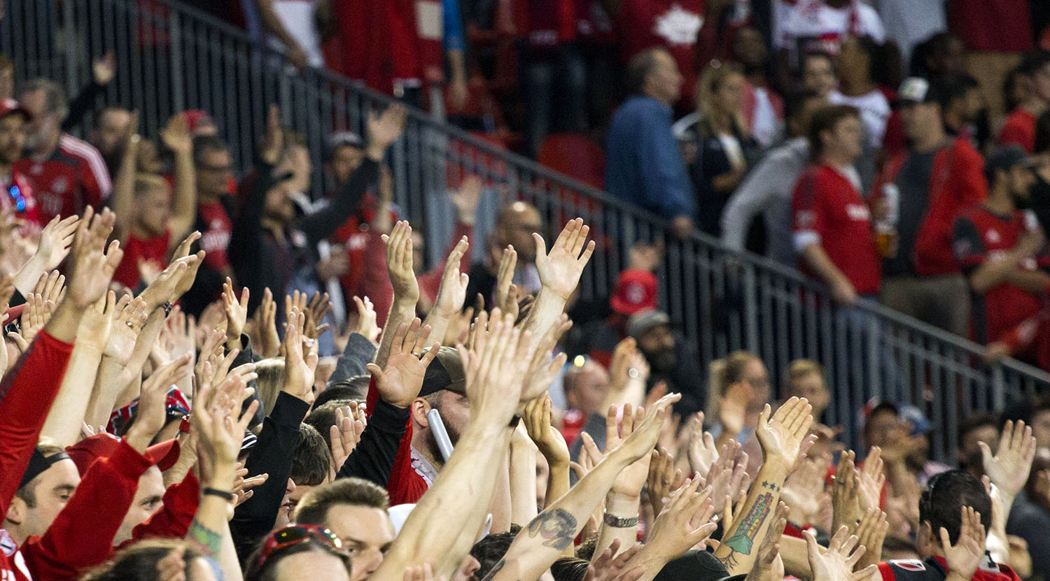 South End supporter's put their hands in the air for the thunder clap. Image by Dennis Marciniak of denMAR Media.