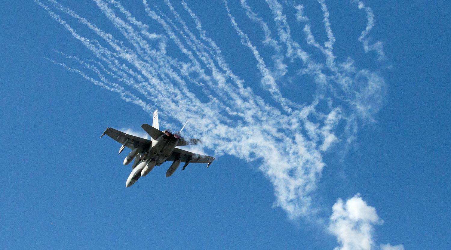 A CF18 flies over BMO Field for Canadian Armed Forces Appreciation Day in 2017. Image by Dennis Marciniak of denMAR Media.