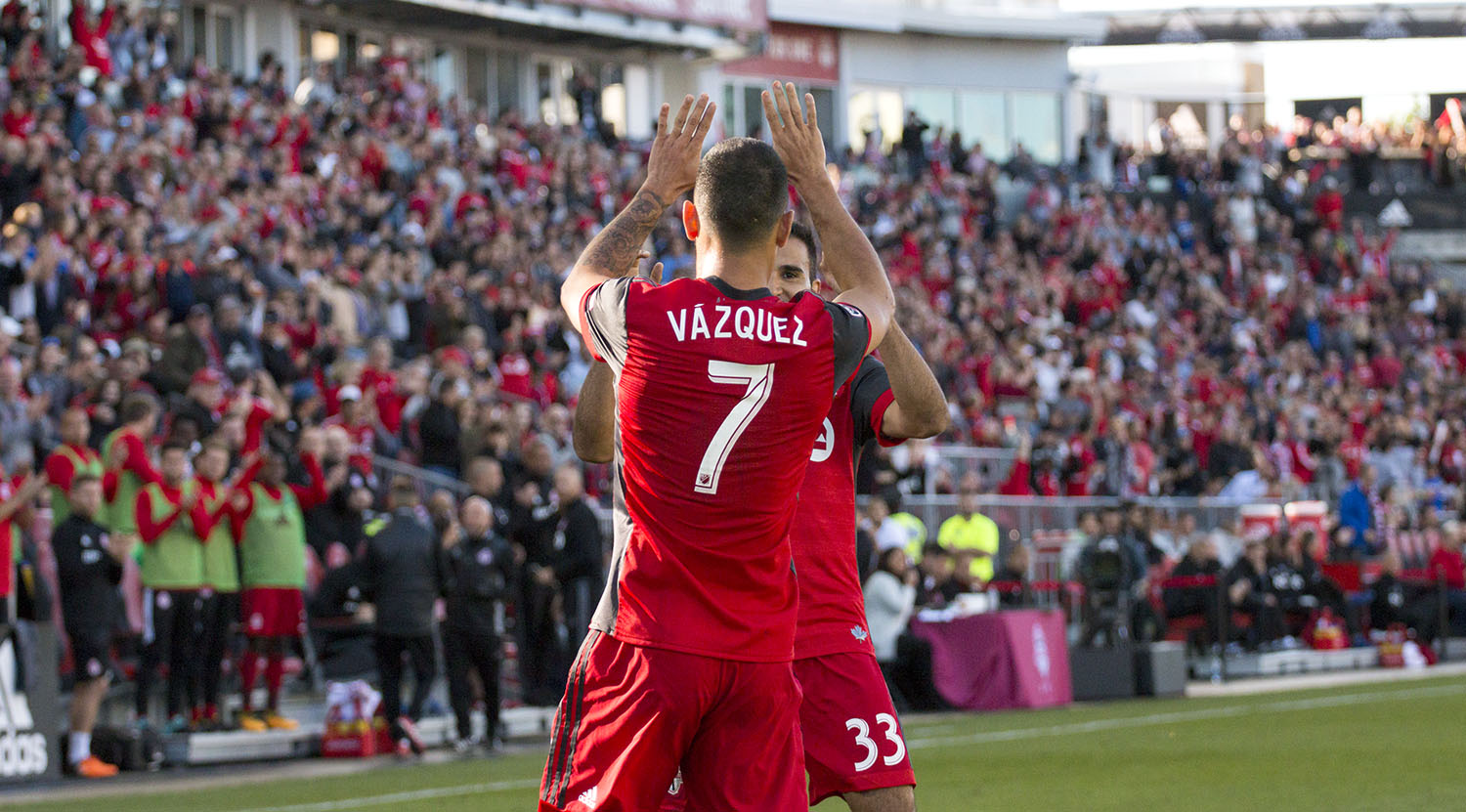 Víctor Vázquez celebrates with Steven Betiashour for the first goal on the day against San Jose. Image by Dennis Marciniak of denMAR Media.
