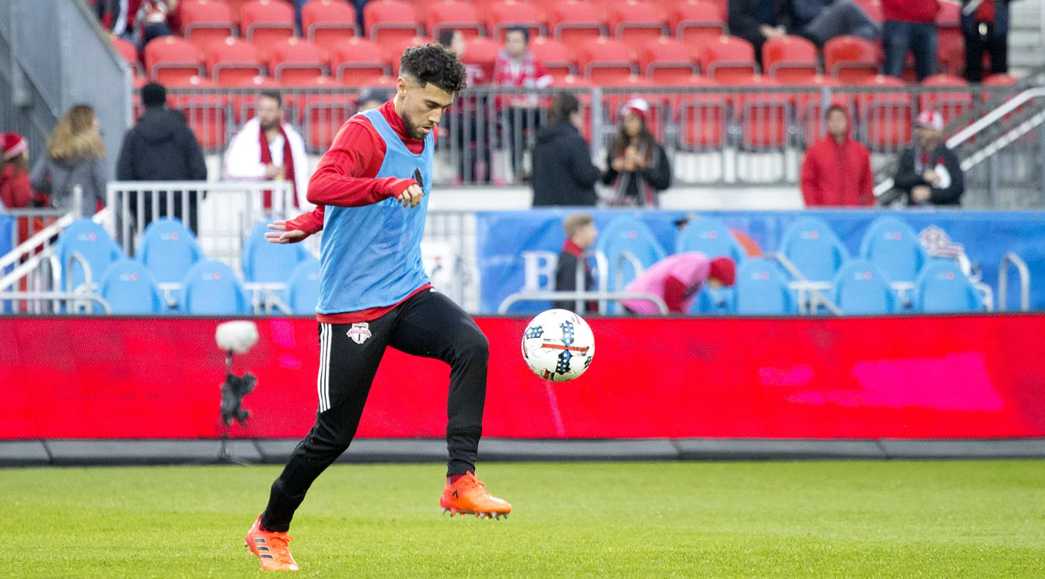 Jonathan Osorio on the ball during warm ups for Toronto FC at BMO Field. Image by Dennis Marciniak of denMAR Media.