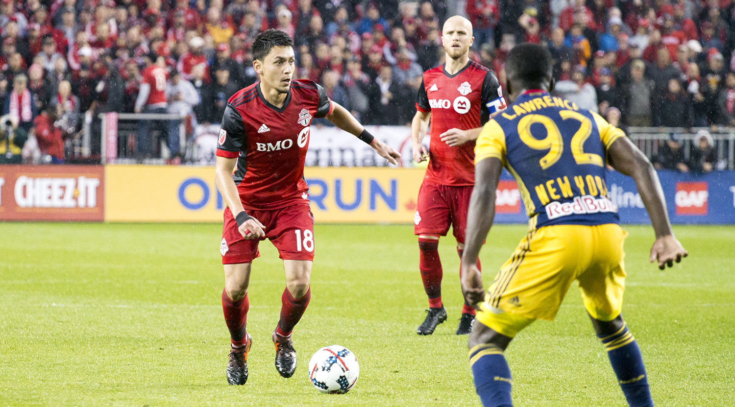 Marky Delgado on the ball in the attacking third during a Toronto FC playoff match in 2017. Image by Dennis Marciniak of denMAR Media.