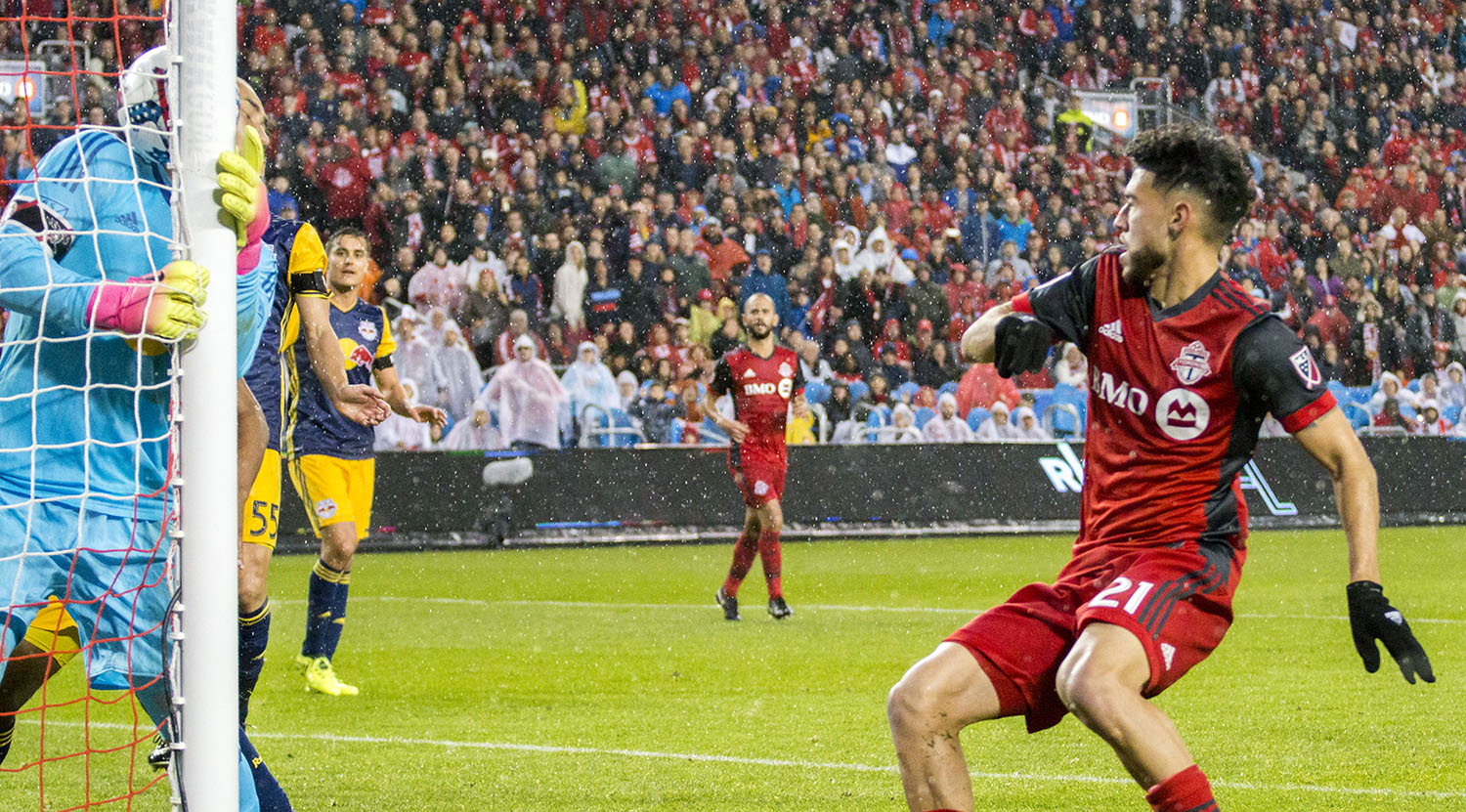 Luis Robles attempts to keep the ball out of the net with his head during a 2017 playoff match against Toronto FC. Image by Dennis Marciniak of denMAR Media.
