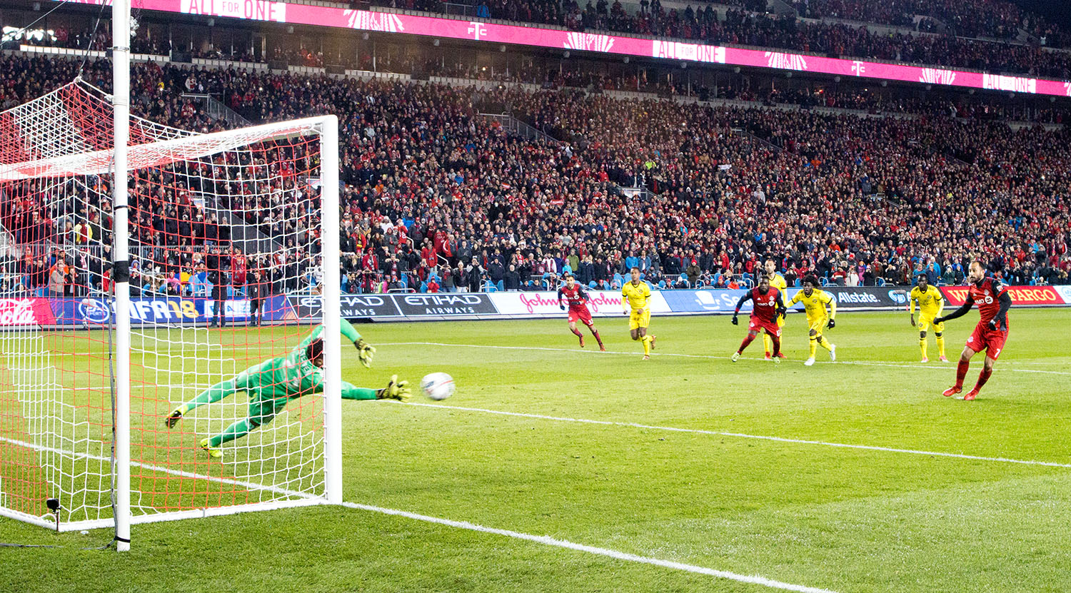 Victor Vazquez takes a penalty kick that is saved by Columbus Crew's goalkeeper Zack Steffen during the 2017 MLS Eastern Conference Final at BMO Field. Image by Dennis Marciniak of denMAR Media.