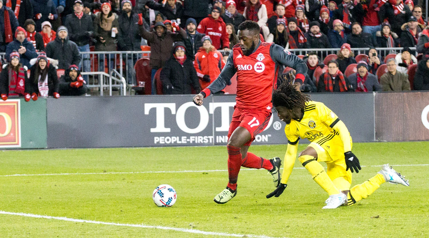 Jozy Altidore about to kick the ball into the back of the net scoring the series deciding goal at BMO Field during the 2017 Major League Soccer playoffs. Image by Dennis Marciniak of denMAR Media.