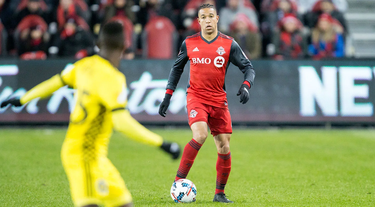 Justin Morrow on the ball as a Columbus Crew player anticipates which direction he will go. Image by Dennis Marciniak of denMAR Media.