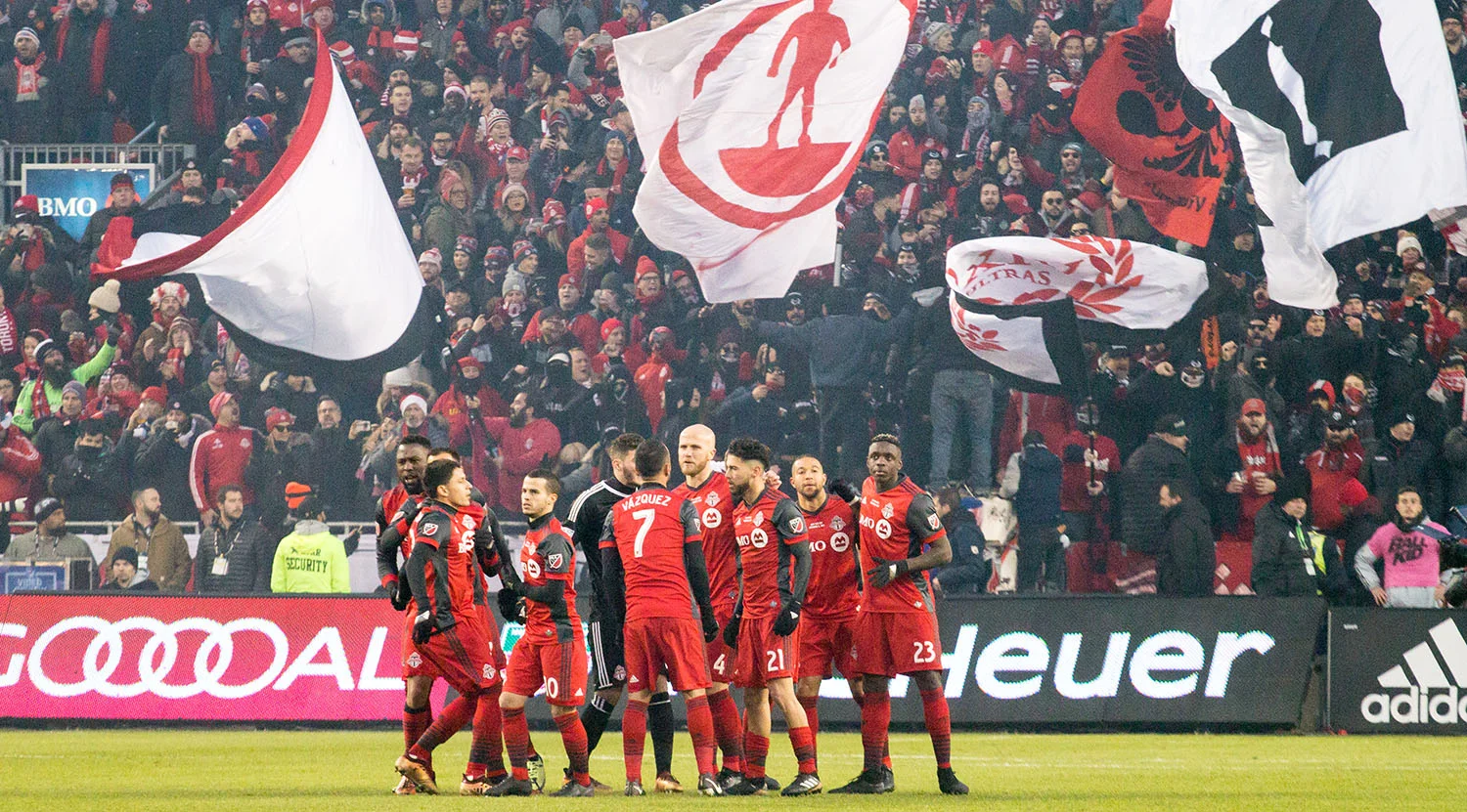 Toronto FC's starting XI breaking away seconds away from kickoff during the 2017 MLS Cup playoffs against Seattle. Image by Dennis Marciniak of denMAR Media.