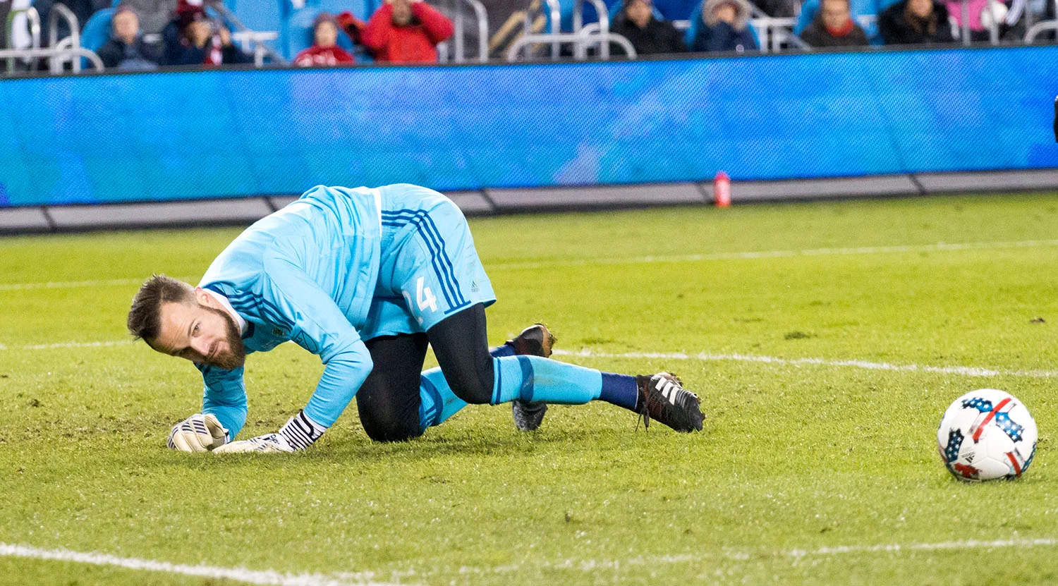 Stefan Frei (former Toronto FC goalkeeper) watching the ball clear his box after a save during the 2017 Major League Soccer Cup Final at BMO Field. Image by Dennis Marciniak of denMAR Media.