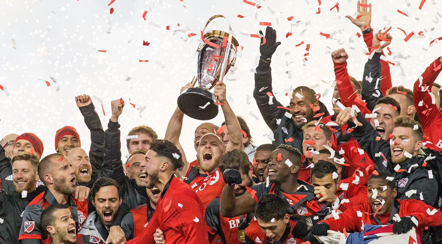 Confetti and smoke fills the stadium as Michael Bradley celebrates with Toronto FC to take home the 2017 MLS Cup. Image by Dennis Marciniak of denMAR Media.