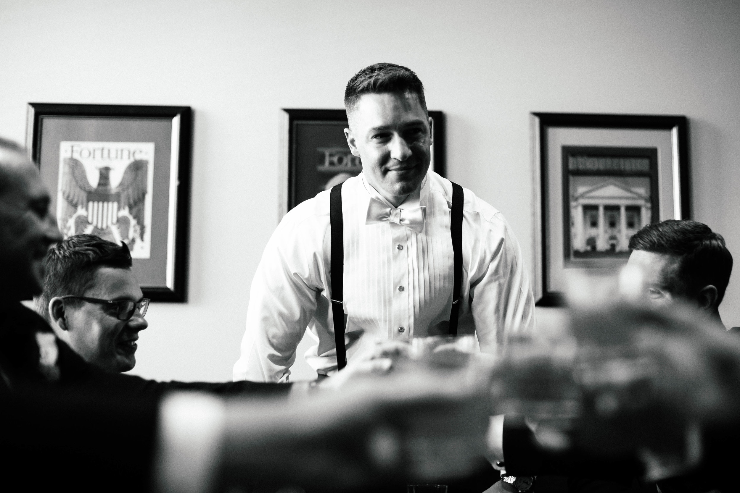 Photography of groomsmen getting ready