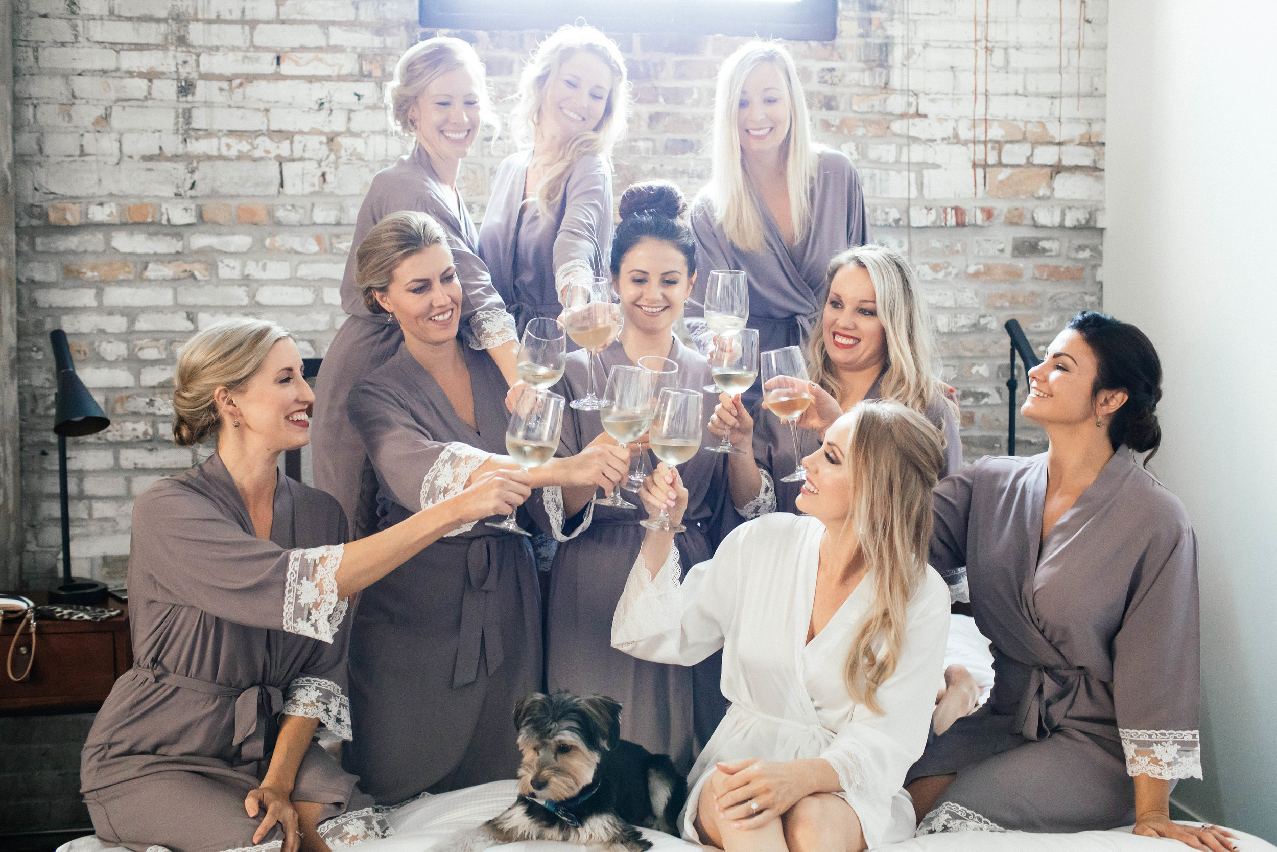 Hewing Hotel Wedding Photography Bridal party Getting Ready in pale purple robes