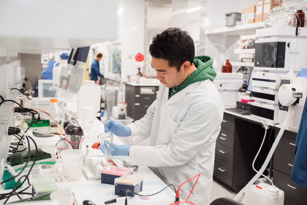 corporate photography of guys working in a lab