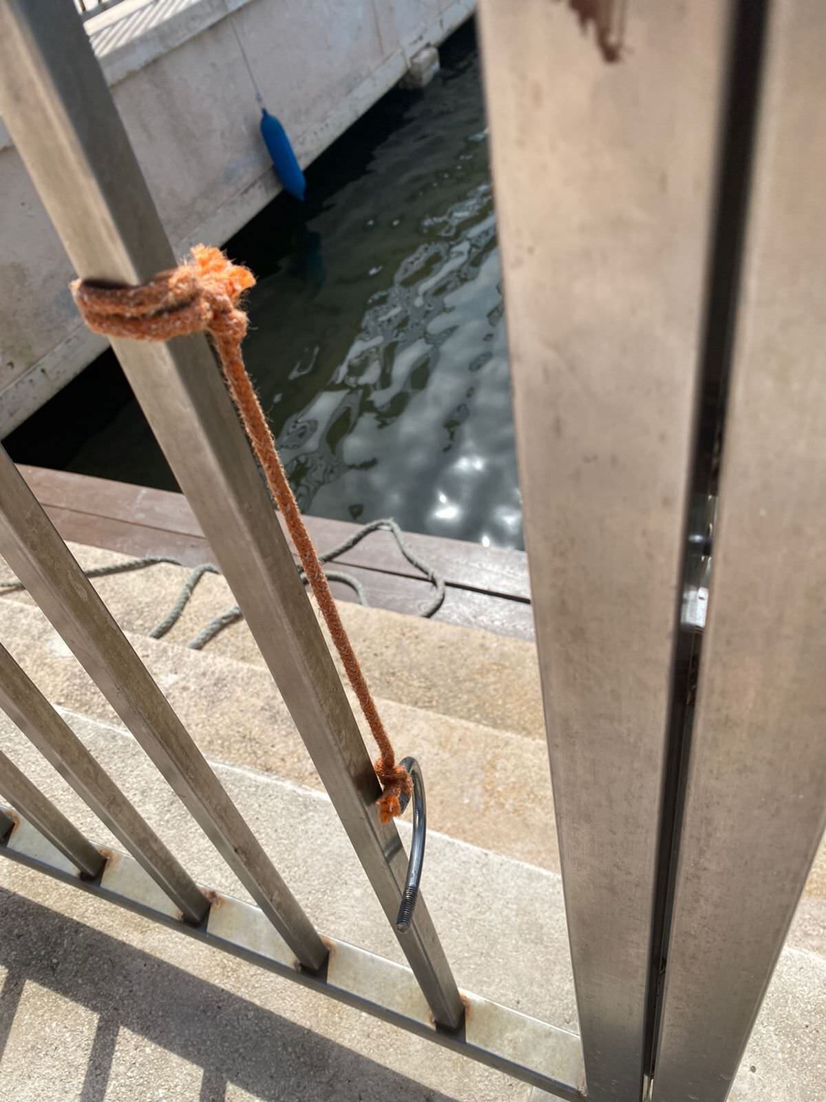 Under deck (buoy) is where crocs nest. Notice latch/pin closure.