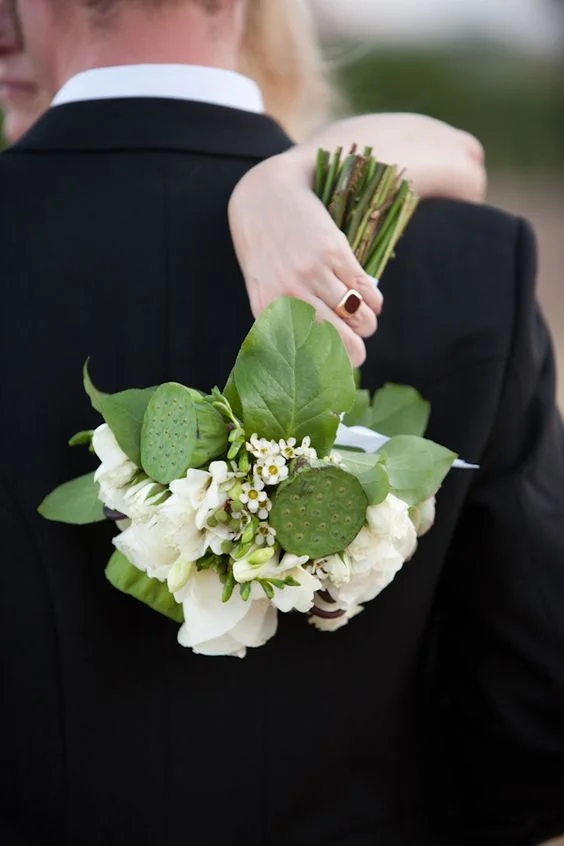 BouquetGroomShoulder.jpg
