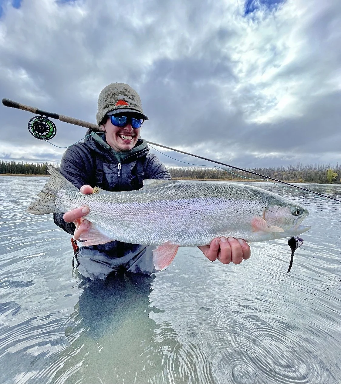 Camden Burggrabe with a gorgeous Alaskan rainbow on the swing