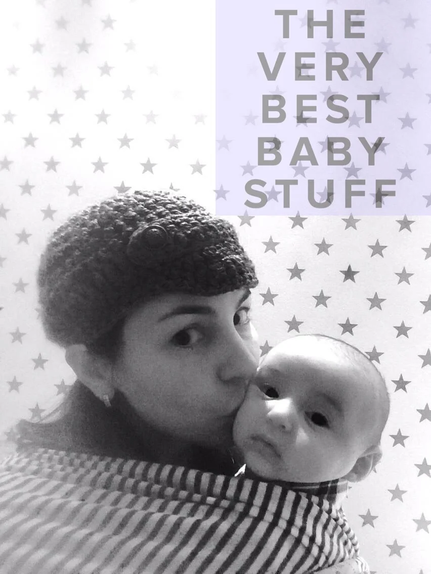 A selfie of me and baby S in the Solly wrap in his nursery. 