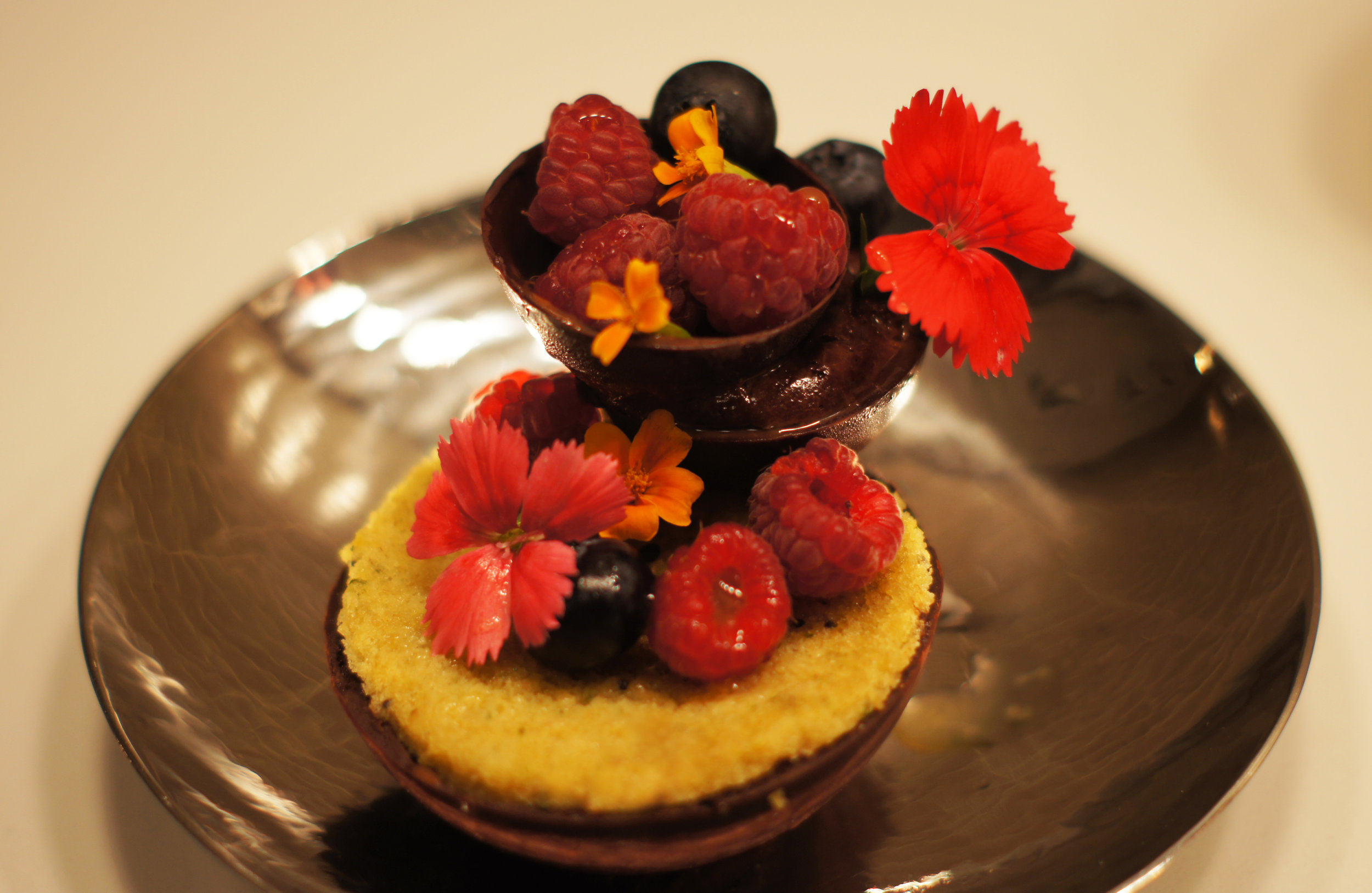 Chocolate forest 70% chocolate mousse, cilantro madeleine and raspberry gelee dessert