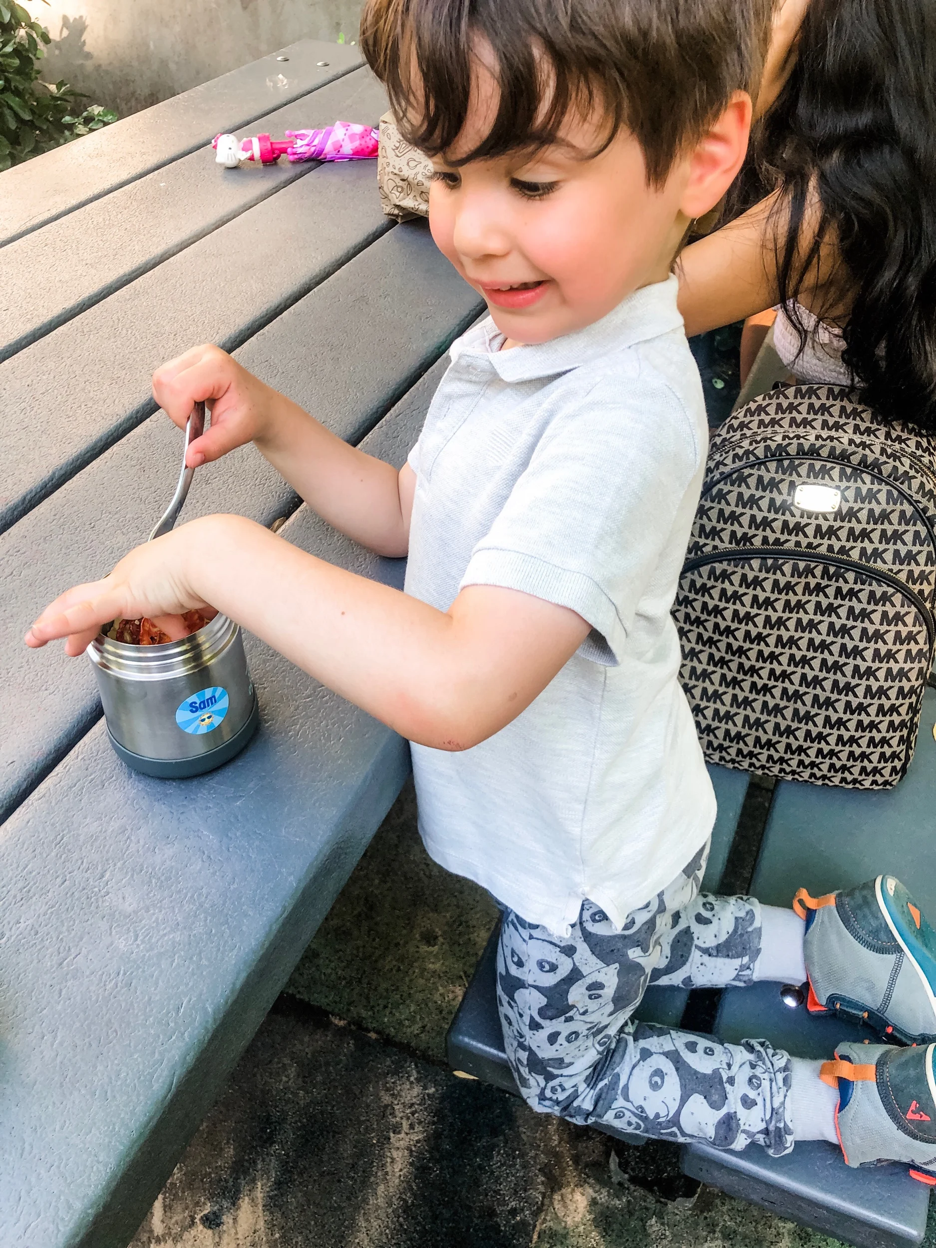 Dining al fresco at the playground! Thermos labeled with a personalized round label .