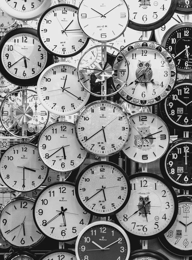 black-and-white-photo-of-clocks-707676.jpg