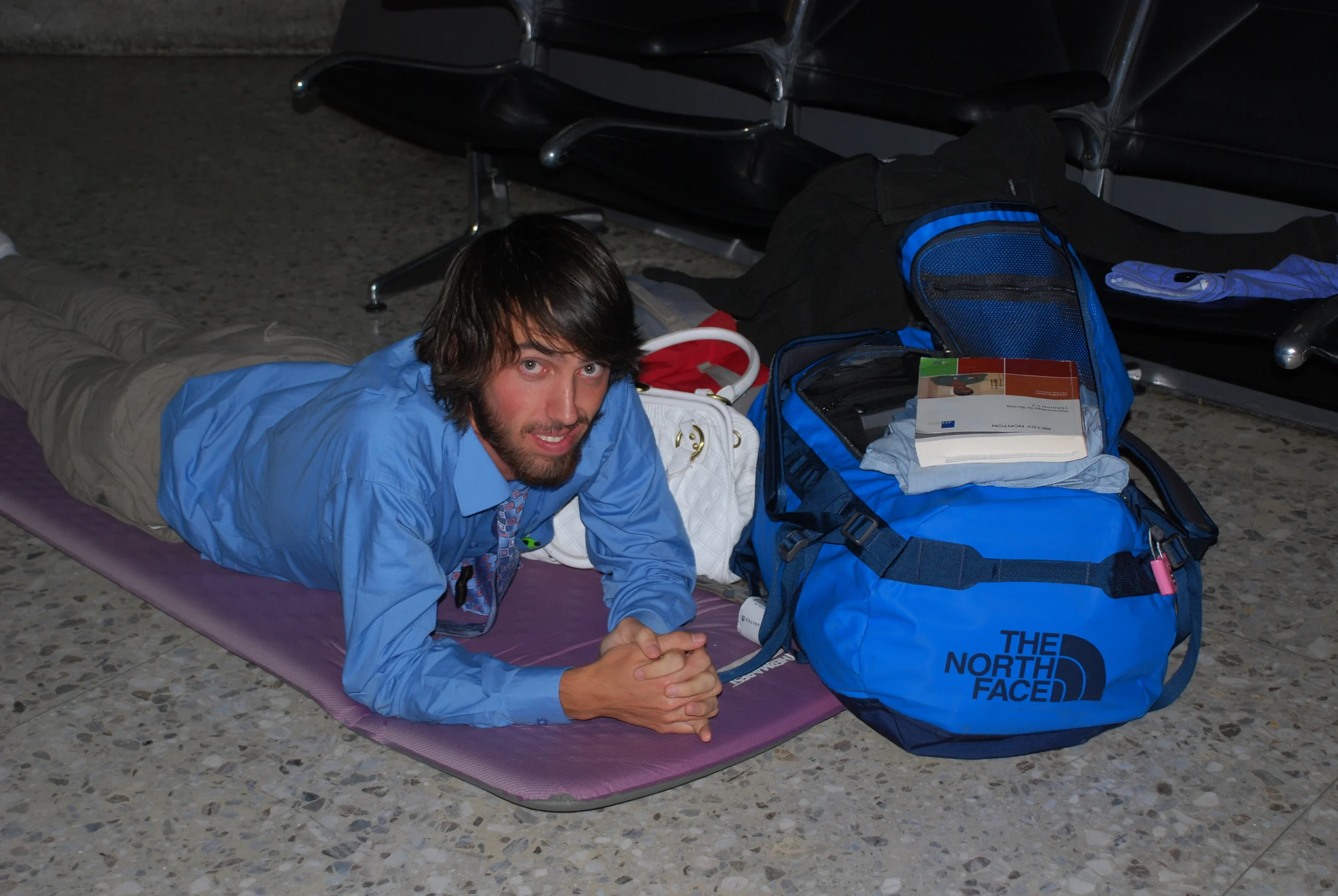 Sleeping on the floor of Dulles International Airport en-route to Africa 